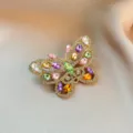 Elegant crystal rhinestone butterfly brooch, luxury gold-tone metal fashion jewelry for women. - 925#