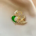 Elegant gold-tone green stone swan rhinestone brooch pin for women suit jacket accessories - 988#