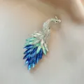 Elegant peacock crystal rhinestone brooch for women, sparkling glass suit accessory. - No. 1022