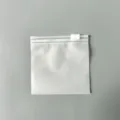 Frosted plastic ziplock storage bag with white slider, portable waterproof mini organizer. - 8x8cm