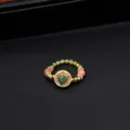 Elastic beaded ring with crystal beads and a green jade fox pendant in gold finish. - 18K Gold Plated