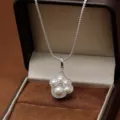 Elegante zilveren kattenpoot hanger ketting met parels en zirkoonstenen - Kattenpoot Stijl (Zilver) / Zilver