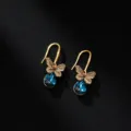 Elegante Schmetterlings-Ohrhaken mit tiefblauen Kristalltropfen in edler Goldoptik - Schmetterling-Anhänger / Dunkelblau