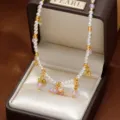 Elegante Perlenkette im französischen Stil mit bunten Perlenanhängern in Geschenkbox - 18K-Gold
