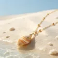 Exquisite seashell pendant necklace detail shot, golden tone ocean beach style jewelry. - Gold Conch Pendant (WXL1230)