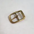 Close-up detail of a mens vintage metal belt buckle replacement accessory, hardware view. - Bronze Clasp