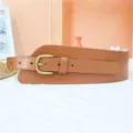Wide brown leather waist belt detail with vintage metal buckle, versatile for dresses. - Camel