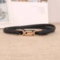 Schlanker schwarzer Ledergürtel für Damen mit goldener Schließe, schönes Detail für Kleider. - Schwarz