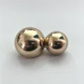 Detailed view of the elegant golden double ball metal belt buckle accessory component. - Gold Buckle