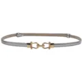 Stylish women's slim silver leather belt featuring a chic gold metal buckle for dresses. - Silver