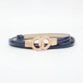 Stylish women's navy blue patent leather thin belt with gold double ring buckle variant. - Blue
