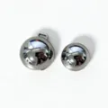 Detailed close-up of polished silver metallic ball buckle fastener for women belts - Silver Buckle