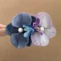 Large blue and purple Phalaenopsis orchid hair clip with pearl accents for elegant hairstyles - Blue & Purple