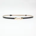 Slim black patent leather belt for women, minimalist waist accessory for dresses and suits. - Black