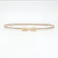 Women's thin golden belt with elegant leaf buckle, versatile decorative waist accessory. - Gold