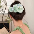 Large mint green orchid hair clip with simulated flower design for women - Cyan
