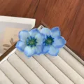 Pince à cheveux élégante narcisse bleu ciel double fleur, idéale pour les vacances - Style Double Fleur / Bleu