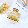 Elegant amber transparent geometric hair claw clip with hollow rectangle design for women - Transparent Brown