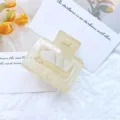 Minimalist cream colored geometric hollow square hair claw clip for women medium size - Jelly Apricot