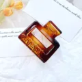 Amber brown rectangular hollow hair claw clip for elegant women's half-up hairstyles - Amber