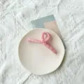 Large pink fabric-wrapped hair claw clip featuring elegant sweet ruffled texture design - Bright Peach Pink