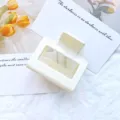 Elegant cream-white hollow rectangular hair claw clip for a minimalist half-up hairstyle - Off White
