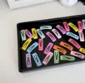 Sweet candy-colored mini snap hair clips for kids and pets in a variety of pastel shades - Solid Square Style