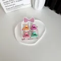 Lot de 4 mini-pinces à cheveux aux couleurs bonbons pour enfants et jeunes filles sur carte - Demi-cercle Rétro / Lot de 4