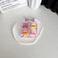 Lot de 4 mini pinces à cheveux aux couleurs acidulées pour filles sur carte déco - Papillon Rond / Lot de 4