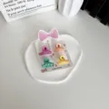 Lot de 4 mini pinces à cheveux aux couleurs bonbon pour filles sur une carte blanche - Motif de Torsades / Lot de 4
