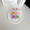 Lot de 4 mini pinces à cheveux mates aux couleurs acidulées pour filles sur carte - Ligne / Lot de 4