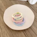 Set of five braided high-elasticity hair ties in assorted pastel colors for daily styling - 5 Pieces / Simple Mixed Style