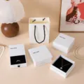 Elegant white jewelry box set featuring embossed rose design for rings and necklaces - Lid and Base Box / 10*10*4cm / Earth Paper White