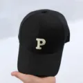 Detailed view of the black baseball cap featuring a clean white letter P embroidery on front. - Adjustable / Black Letter P Embroidered Baseball Cap