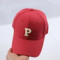 Classic red baseball cap with white embroidered letter P, breathable sun protection design. - Adjustable / Red Letter P Embroidered Baseball Cap