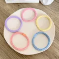 Set of five pastel colored braided high elastic hair ties displayed on a white plate - 5 Pieces / Solid Color Striped Style