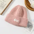 Cute pink knitted beanie hat for women, thick warm winter woolen cap with cute embroidery. - One Size / Pink