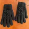 Close-up of black knit gloves with cozy cable pattern and ribbed cuffs for winter warmth. - XL / No Label Oversized Twist Knit Black