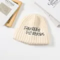 Korean style cute knitted beanie for women, thick warm winter hat with embroidered letters. - White