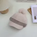 Detailed close-up of a Japanese style striped knitted hat with cute pom-pom and warm wool texture. - Adjustable / Off White