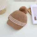 Winter women knitted pom pom hat with visor and cozy stripe design, detailed winter warm cap view. - Adjustable / Khaki