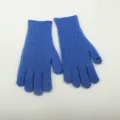 Detailed view of the blue knitted fingerless gloves showing ribbed texture and open-finger design. - Blue