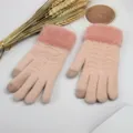Close-up detail of winter women knit touchscreen gloves with soft fluffy plush cuffs and warm design. - Dusty Pink Faux Fur Trim