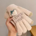 Detail shot of winter knitted touch screen gloves featuring cute fruit embroidery and text. - Strawberry Woolen Gloves - Beige