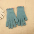 Close-up detail of women winter knit fingerless gloves with cozy ribbed cuff and cute trim. - One Size / Lake Blue