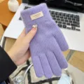 Detailed view of women winter warm knitted woolen gloves in candy purple color, soft and cozy. - Light Purple