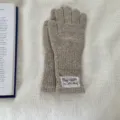 Close-up of cozy knit long fingerless gloves with elegant lace patch detail, autumn winter. - One Size / Khaki