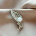 Exquisite leaf brooch detailed view, silver alloy with sparkling rhinestones and pearl. - Gold