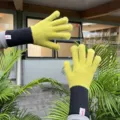 Detailed view of women's knitted long gloves, green and black color block split finger design. - One Size / Light Green Patchwork Long Tube