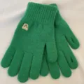 Close-up of green knit gloves with cute bear embroidery, soft and warm winter daily wear. - Green